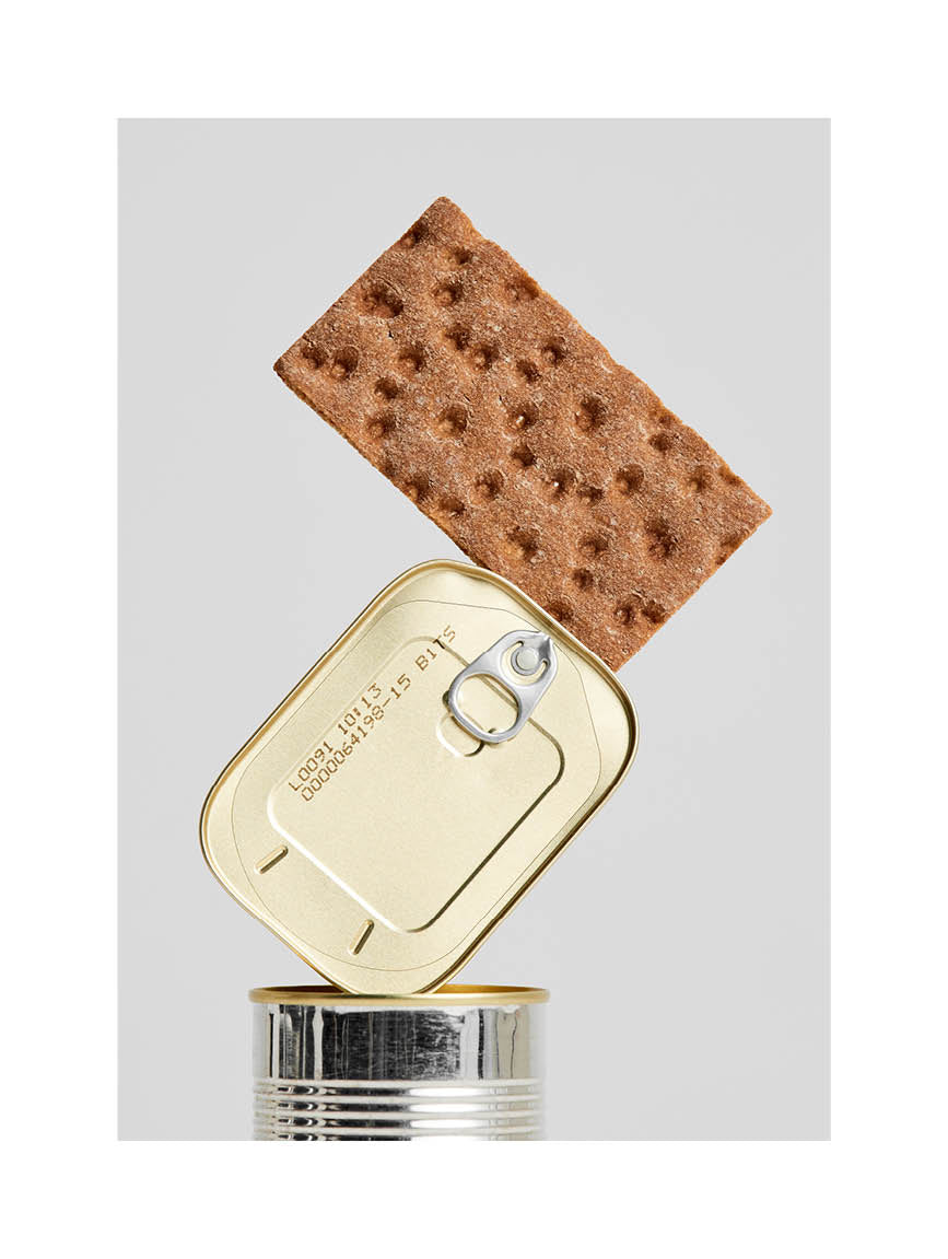 Conceptual fine art print featuring crispbread balanced on a tin can. Minimalist Scandinavian kitchen wall art from Monday Gallery.