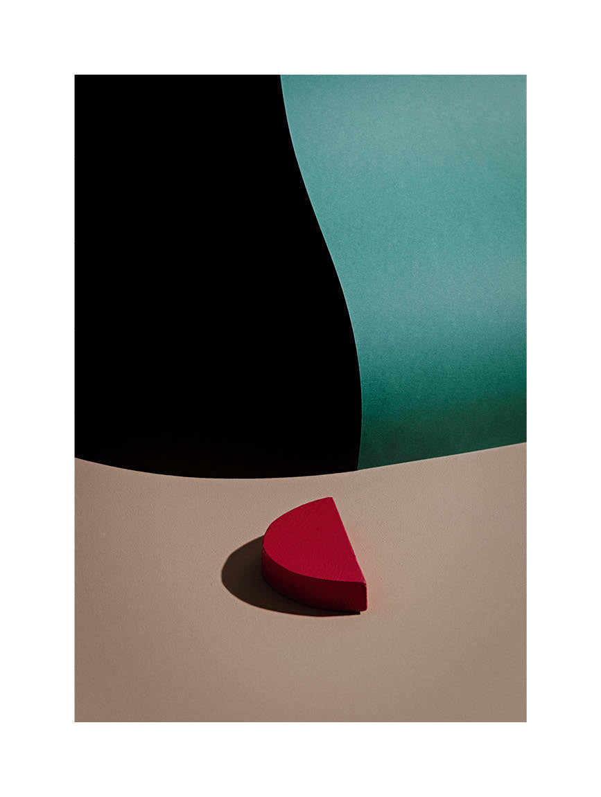 Abstract fine art print featuring vivid red and cyan forms with bold contrast and soft shadows on beige background. Minimalist Scandinavian photography exploring color balance and geometry. Printed in Sweden, exclusive at Monday Gallery.