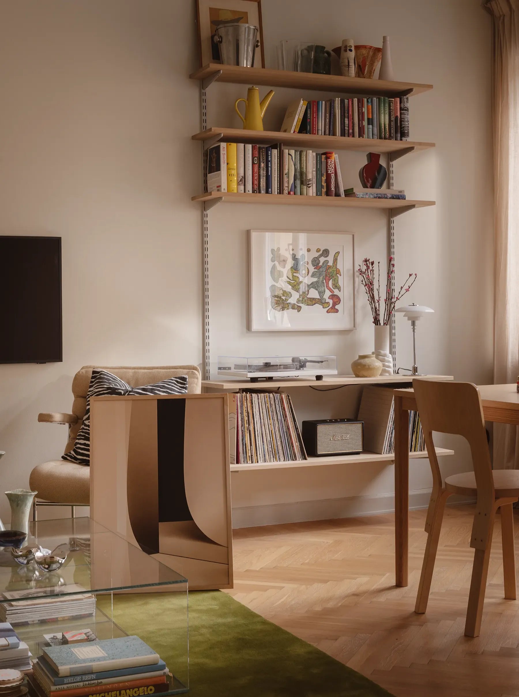 Fine art print “Beige Simplicity No.2” by Monday Gallery, displayed in a Scandinavian living room with warm light, wood furniture, and modern design elements.