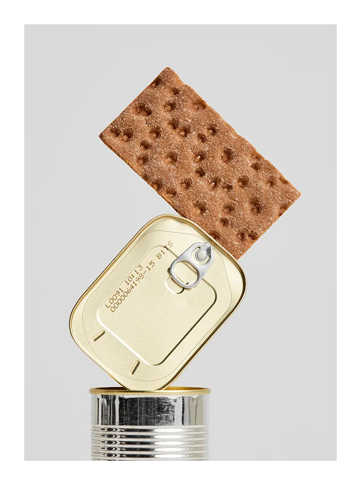 Conceptual fine art print featuring crispbread balanced on a tin can. Minimalist Scandinavian kitchen wall art from Monday Gallery.