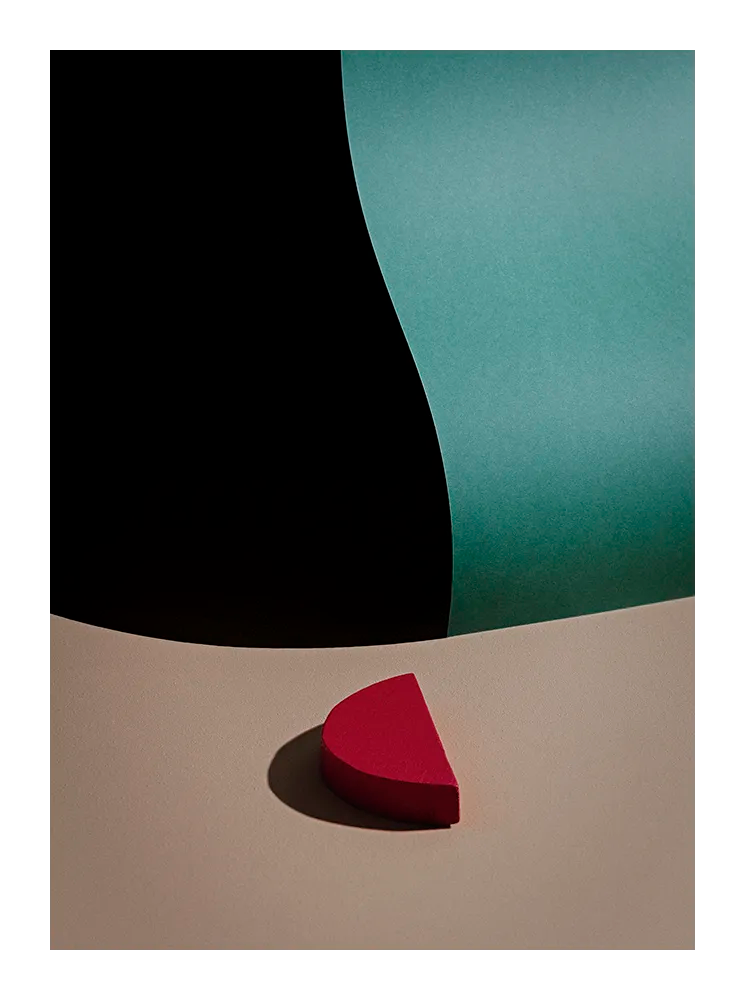 Abstract fine art print featuring vivid red and cyan forms with bold contrast and soft shadows on beige background. Minimalist Scandinavian photography exploring color balance and geometry. Printed in Sweden, exclusive at Monday Gallery.