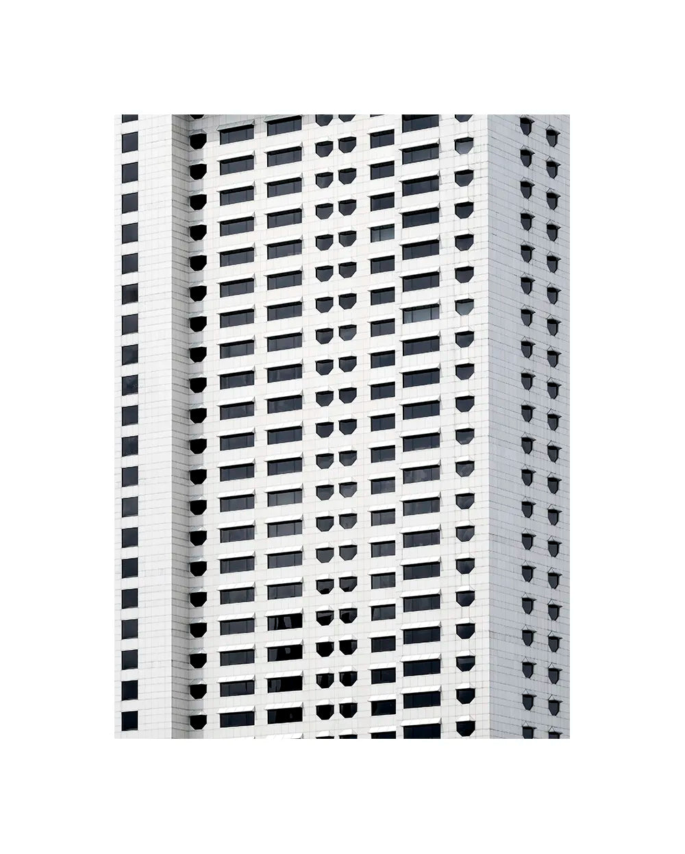 Minimalist architectural fine art print of a white geometric building facade with repeating window grid.